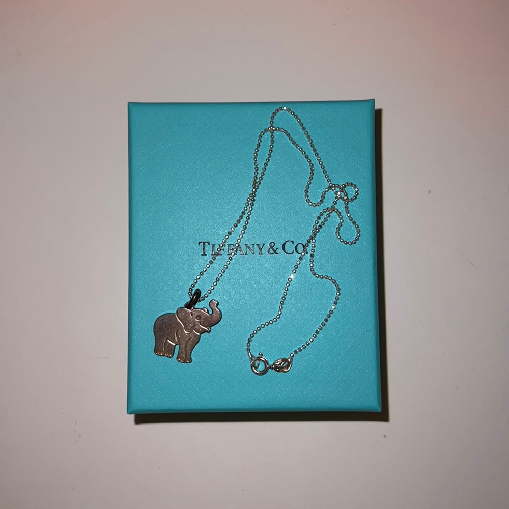 Tiffany & Co. ; Elephant never forgets charm + sterling silver chain